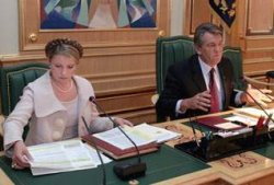 Ющенко обязал Тимошенко удержать инфляцию