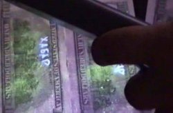 В Киеве ходят доллары с надписью «хабар»