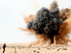 Авиация Каддафи бомбит отбитые повстанцами города