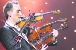Житель Львова первым в мире сыграл на 4 скрипках