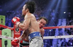 Маркес нокаутировал Пакьяо в бою за пояс "боксера десятилетия"